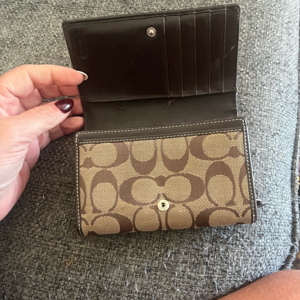 Brown "C" coach wallet.